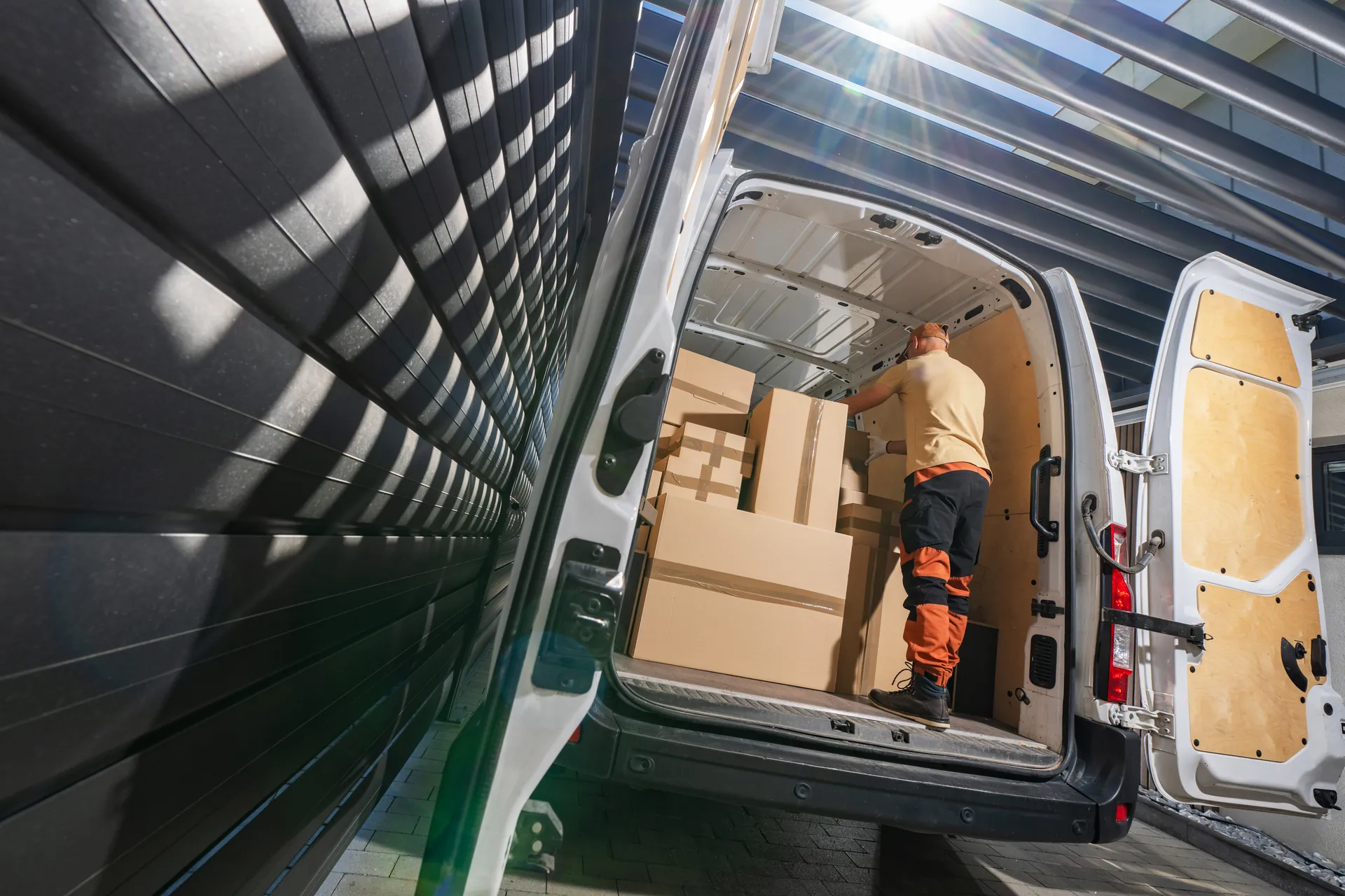 Service van arriving for same-day garage door repair